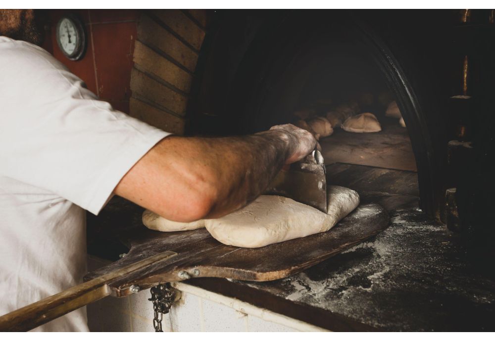 Baking Bread in a Traditional Wood Fired Bread Oven